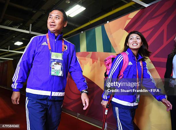 Norio Sasaki, head coach of Japan arrives with Kozue Ando at the FIFA Women's World Cup Final between USA and Japan at BC Place Stadium on July 5,...