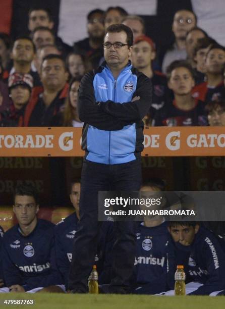 Brazil's Gremio coach Enderson Moreira gestures during the Copa Libertadores 2014 group 6 football match against Argentina's Newell's Old Boys at...