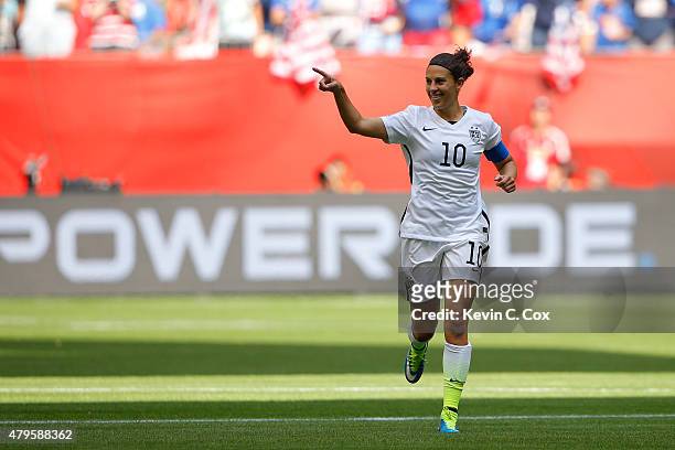 Carli Lloyd of the United States celebrates scoring the opening goal against Japan in the FIFA Women's World Cup Canada 2015 Final at BC Place...