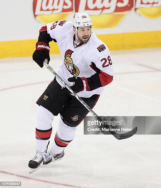 Matt Kassian of the Ottawa Senators skates down the ice during first period action in an NHL game against the Winnipeg Jets at the MTS Centre on...