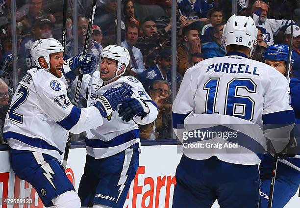 Tyler Johnson and Ryan Malone of the Tampa Bay Lightning celebrate a Tyler Johnson goal against the Toronto Maple Leafs during NHL game action March...