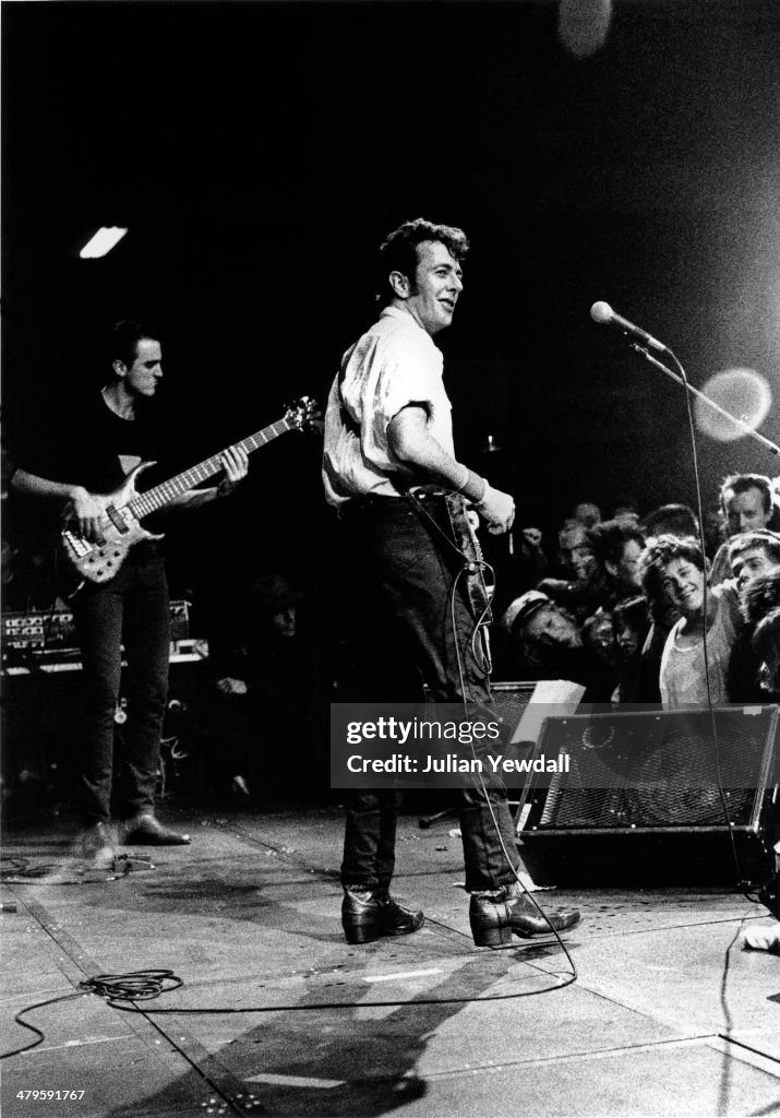 Strummer With Latino Rockabilly War