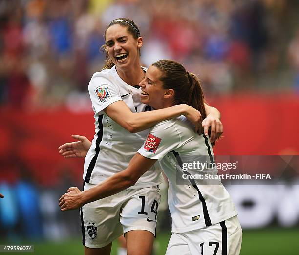 Tobin Heath of USA celebrates scoring the fifth goal with Morgan Brian during the FIFA Women's World Cup Final between USA and Japan at BC Place...