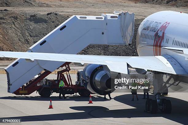 Ground crews prepare the Aeronexus Corporation's - Boeing 767 used by the Rolling Stones in readiness for takeoff at Perth international airport on...