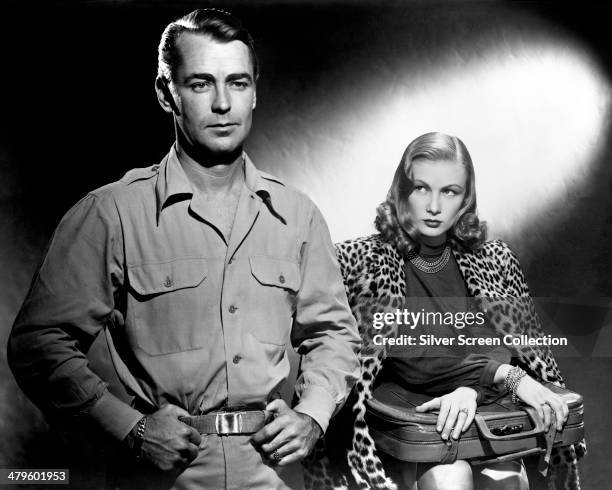 American actors Alan Ladd and Veronica Lake in a promotional portrait for 'Saigon', directed by Leslie Fenton, 1948.