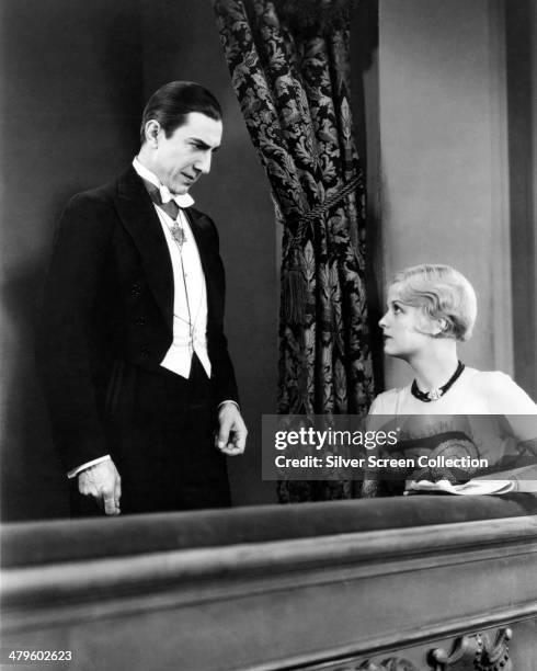 Hungarian actor Bela Lugosi as the vampire Count Dracula and American actress Frances Dade as Lucy Weston in 'Dracula', directed by Tod Browning,...