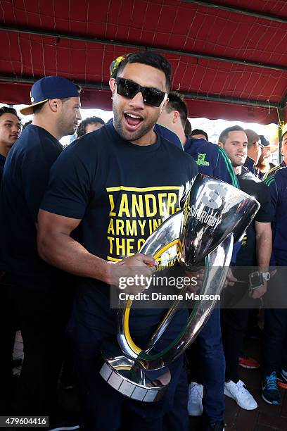 Lima Sopoaga of the Highlanders poses with the trophy during a street parade to celebrate the Highlanders Super Rugby Grand Final victory, on July 6,...