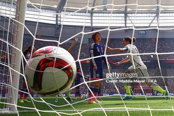 Mizuho Sakaguchi of Japan reacts after Carli Lloyd of United States of America scored a goal during the FIFA Women's World Cup 2015 final match...