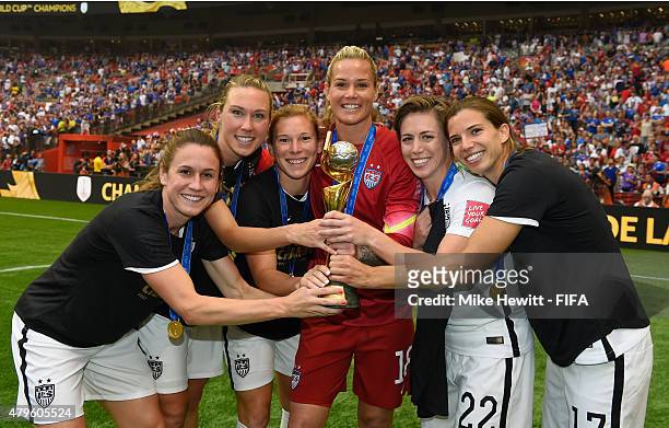 Heather O'Reilly, Whitney Engen, Lori Chalupny, Ashlyn Harris, Meghan Klingenberg and Tobin Heath of USA celebrate with the Trophy after the FIFA...