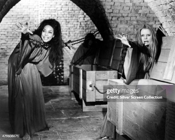 English actress Valerie Van Ost , as Jane, and Maggie Fitzgerald as a vampire girl, in 'The Satanic Rites of Dracula', directed by Alan Gibson, 1973.
