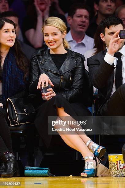 Dianna Agron attends a basketball game between the San Antonio Spurs and the Los Angeles Lakers at Staples Center on March 19, 2014 in Los Angeles,...
