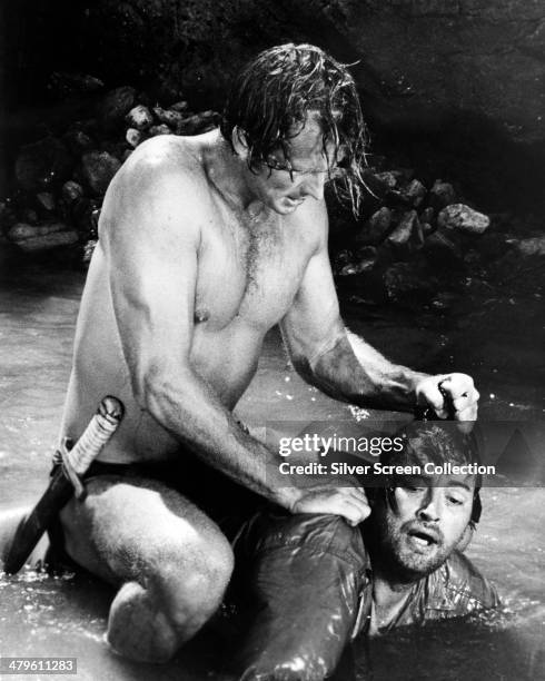 American actor Ron Ely plays the title role in a fight scene from an episode of the US TV series 'Tarzan', circa 1967.