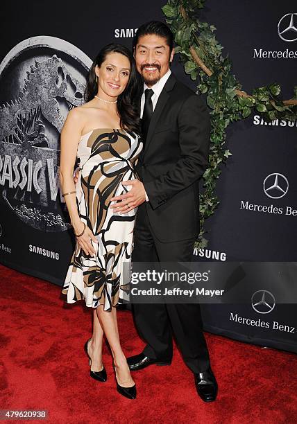 Actors Brian Tee and Mirelly Taylor arrive at the 'Jurassic World' - World Premiere at Dolby Theatre on June 9, 2015 in Hollywood, California.