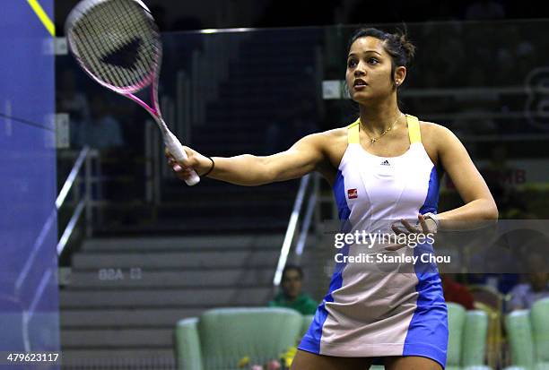 Dipika Pallikal of India plays a shot against Raneem El Weleiley of Egypt during the Round of 16th matches of the CIMB Women's World Championship at...