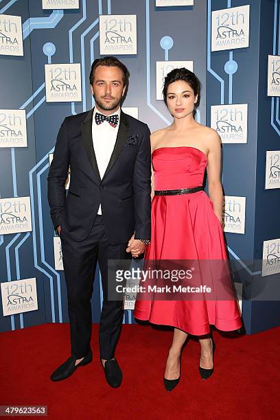 Darren McMullen and Crystal Reed arrive at the 12th ASTRA Awards at Carriageworks on March 20, 2014 in Sydney, Australia.