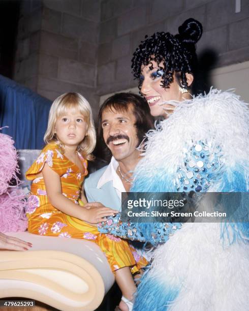 American pop singing duo Sonny & Cher with their daughter Chastity , circa 1973. Left to right: Chastity Bono, Sonny Bono and Cher.