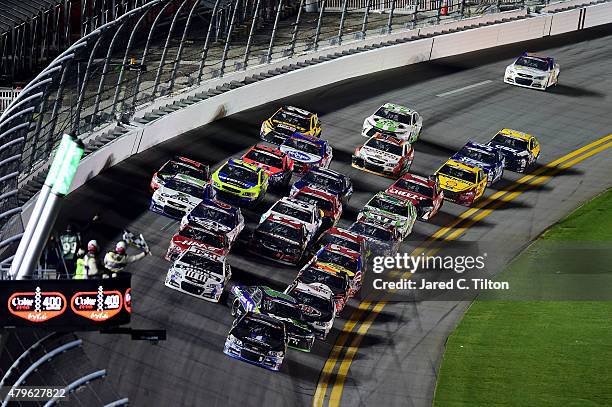 Dale Earnhardt Jr., driver of the Nationwide Stars and Stripes Chevrolet, takes the checkered flag to win the NASCAR Sprint Cup Series Coke Zero 400...