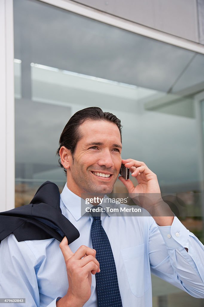 Businessman talking on cell phone