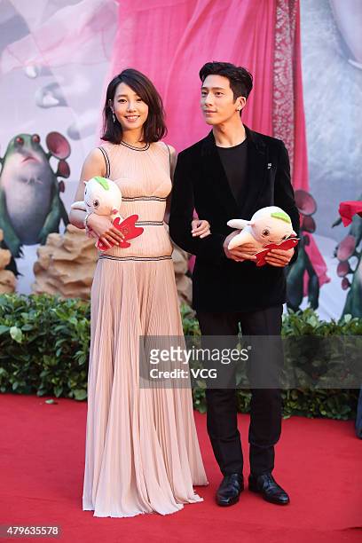 Actress Bai Baihe and actor Jing Boran arrive at the red carpet for the premiere of new film "Monster Hunt" directed by Xu Chengyi on July 5, 2015 in...