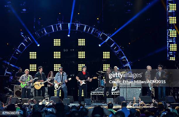 Guitarist Jeff Cook of Alabama, musician Chris Thompson and guitarist James Young of the Eli Young Band, singer/guitarist Randy Owen of Alabama,...