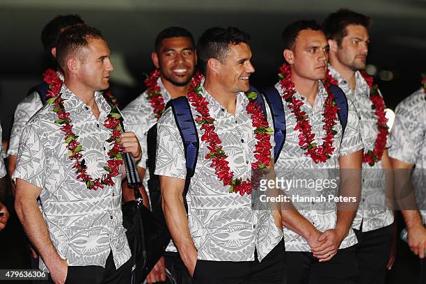 Andy Ellis, Charles Piutau, Daniel Carter and Israel Dagg of the New Zealand All Blacks are welcomed at Faleolo Airport on July 6, 2015 in Apia,...