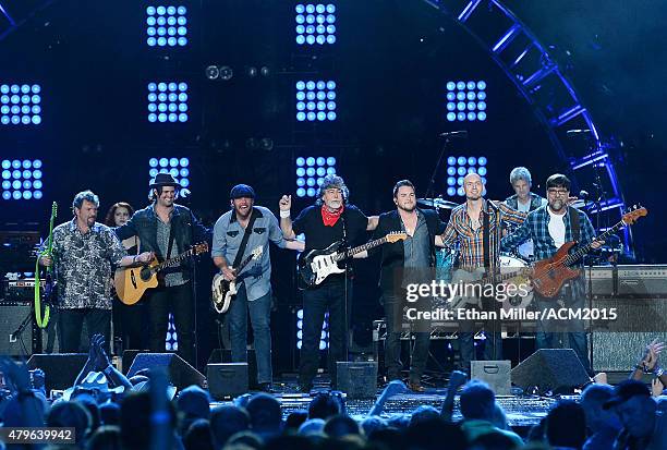 Guitarist Jeff Cook of Alabama, musician Chris Thompson and guitarist James Young of the Eli Young Band, singer/guitarist Randy Owen of Alabama,...