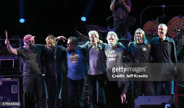 Trey Anastasio, Phil Lesh, Bill Kreutzmann, Bob Weir, Mickey Hart, Jeff Chimenti and Bruce Hornsby of The Grateful Dead perform during the "Fare Thee...