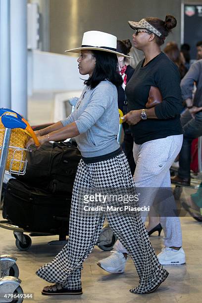 Queen Latifah and Eboni Nichols are seen at Charles-de-Gaulle airport on July 6, 2015 in Paris, France.