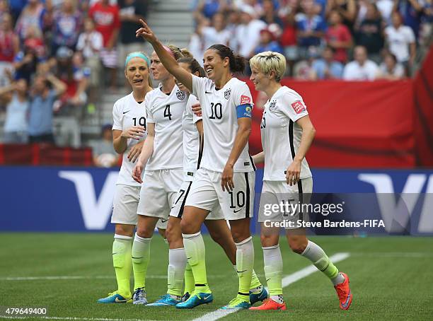 Carli Lloyd of USA celebrates scoring her 3rd goal with her team mates during the FIFA Women's World Cup 2015 Final between USA and Japan at BC Place...