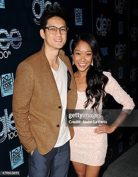 Actor Harry Shum, Jr. And actress Shelby Rabara attend the "Glee" 100th episode celebration at Chateau Marmont on March 18, 2014 in Los Angeles,...