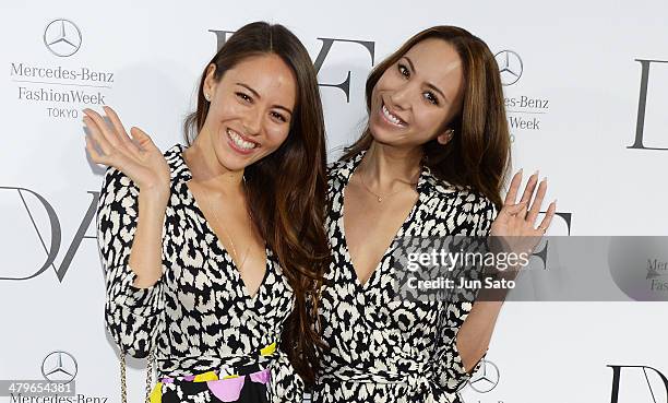 Models Jessica Michibata and Angelica Michibata attend the DIANE von FURSTENBERG show as part of Mercedes Benz Fashion Week TOKYO 2014 A/W at Shibuya...