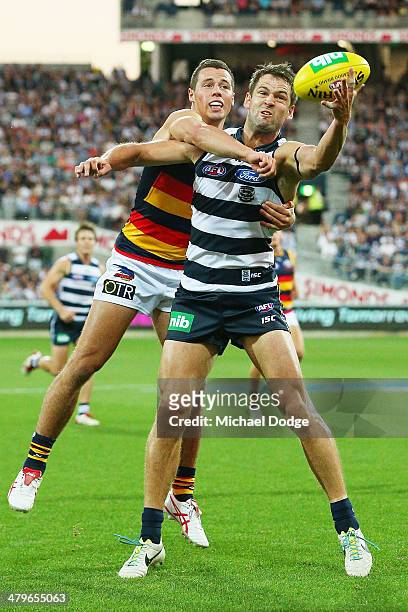Jared Rivers of the Cats marks the ball during the round one AFL match between the Geelong Cats and the Adelaide Crows at Skilled Stadium on March...