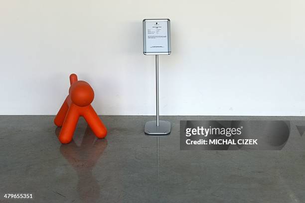 Puppy chair by Finnish designer Eero Aarnio is displayed next to a sign reading "Porsche 911 Turbo Coupe" in the empty Porsche museum in Vratislavice...