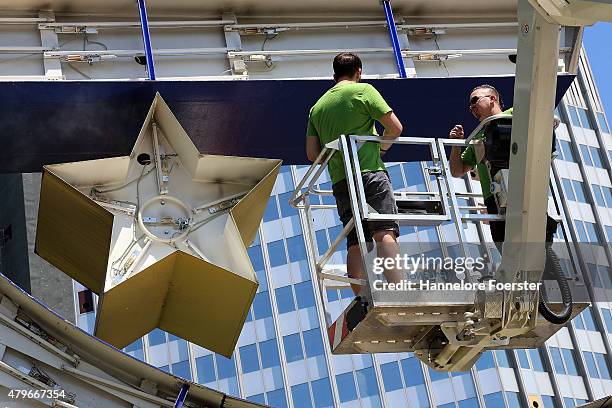 The Euro sculpture, near the old ECB headquarters, undergoes maintenance on July 6, 2015 in Frankfurt, Germany. The DAX dropped slightly in the...