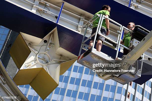 The Euro sculpture, near the old ECB headquarters, undergoes maintenance on July 6, 2015 in Frankfurt, Germany. The DAX dropped slightly in the...