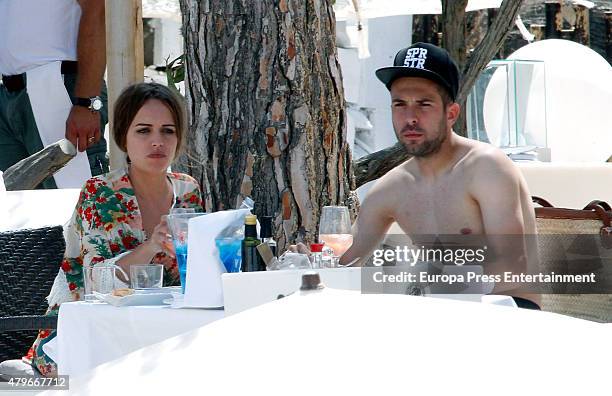 Barcelona football player Jordi Alba and Romarey Ventura are seen on July 4, 2015 in Ibiza, Spain.