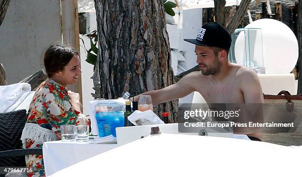 Barcelona football player Jordi Alba and Romarey Ventura are seen on July 4, 2015 in Ibiza, Spain.