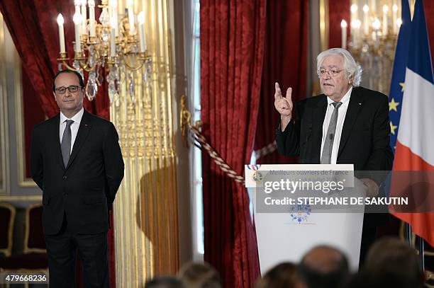 French President Francois Hollande attends a meeting with the Meilleurs Ouvriers de France as the President of the « Un des Meilleurs Ouvriers de...