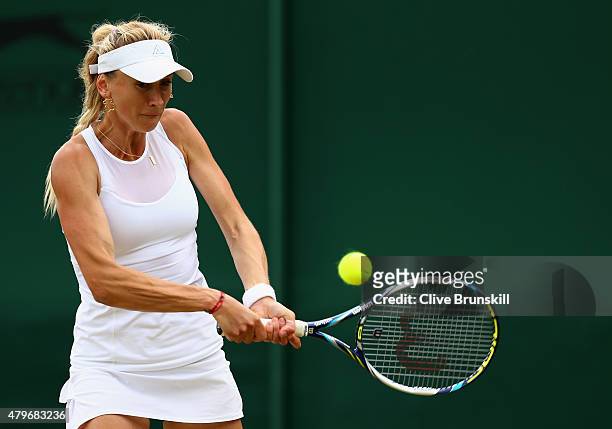 Olga Govortsova of Belarus returns a shot in her Ladies' Singles Fourth Round match against Madison Keys of the United States during day seven of the...
