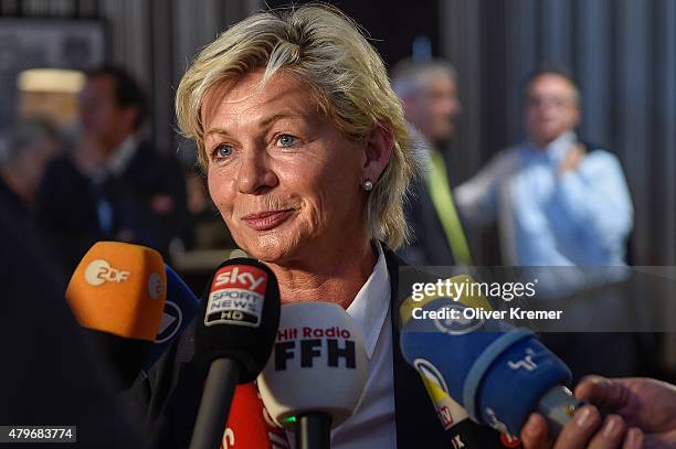 Silvia Neid talks to the media after the German team returned from the FIFA Women's World Cup in Canada at Frankfurt International Airport on July 6,...