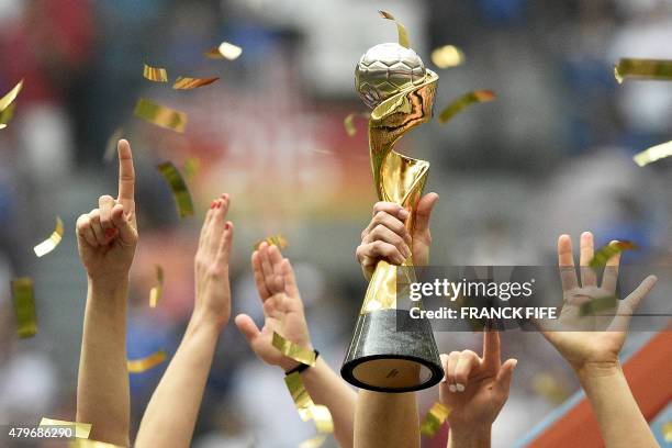 Players celebrate after winning the final football match between USA and Japan during their 2015 FIFA Women's World Cup at the BC Place Stadium in...