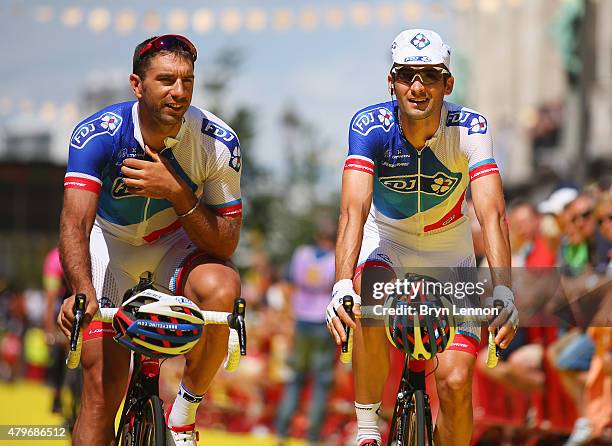 William Bonnet of France and FDJ and Benoit Vaugrenard of France and FDJ ride past the crowds ahead of the start of stage three of the 2015 Tour de...