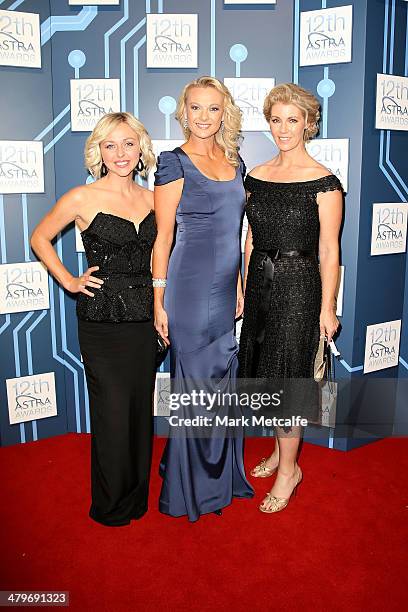 Brooke Corte, Celina Edmonds and Ingrid Willinge arrive at the 12th ASTRA Awards at Carriageworks on March 20, 2014 in Sydney, Australia.