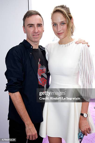 Fashion Designer Raf Simons and actress Leelee Sobieski pose backstage after the Christian Dior show as part of Paris Fashion Week Haute-Couture...