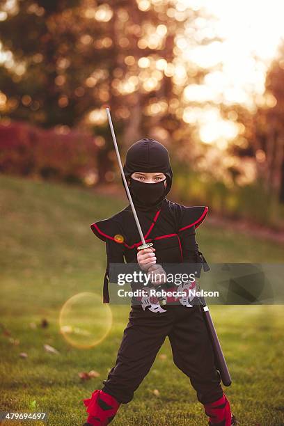 boy in ninja costume - ninja kid stock pictures, royalty-free photos & images