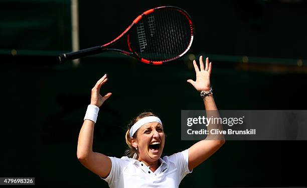 Timea Bacsinszky of Switzerland celebrates match point in her Ladies' Singles Fourth Round match against Monica Niculescu of Romania during day seven...