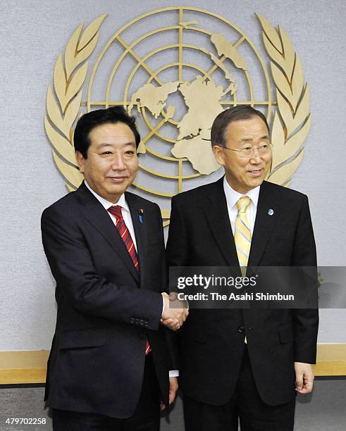 Japanese Prime Minister Yoshihiko Noda and United Nations Secretary General Ban Ki-Moon shake hands duirng the U.N. General Assembly on September 21,...