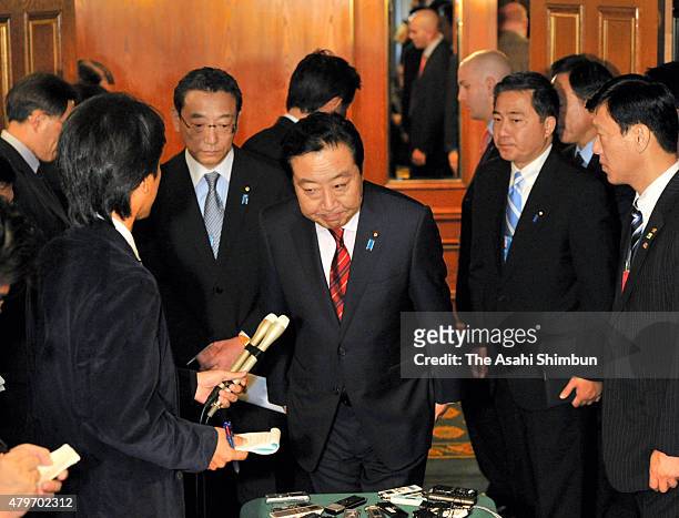 Japanese Prime Minister Yoshihiko Noda speaks to media reporters after his meeting with U.S. President Barack Obama on the sidelines of the 66th...