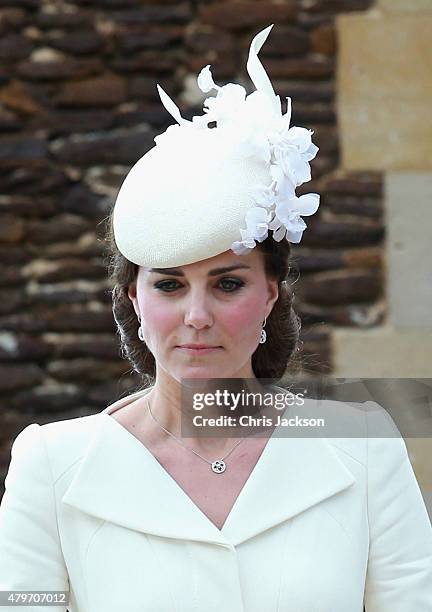 Catherine, Duchess of Cambridge pushes Princess Charlotte of Cambridge in her pram they leave the Church of St Mary Magdalene on the Sandringham...