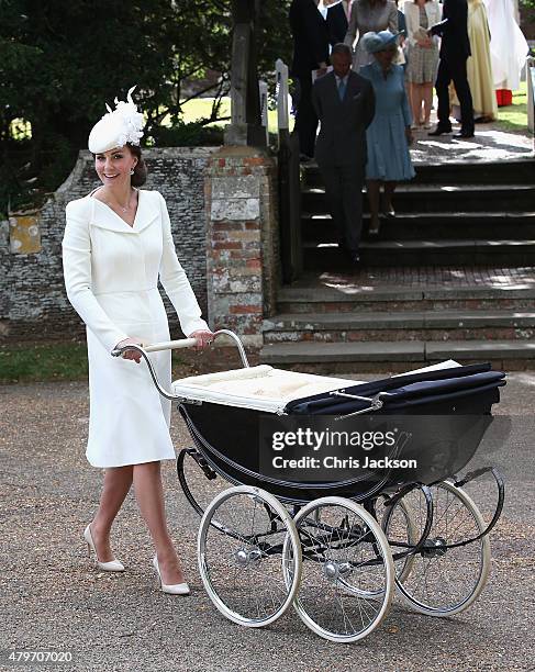 Catherine, Duchess of Cambridge pushes Princess Charlotte of Cambridge in her pram they leave the Church of St Mary Magdalene on the Sandringham...